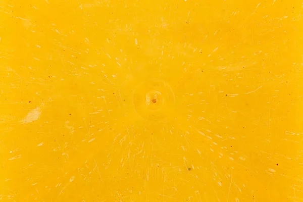 Плоская текстура крупным планом и фон из жёлтого бакелита или карболита — стоковое фото