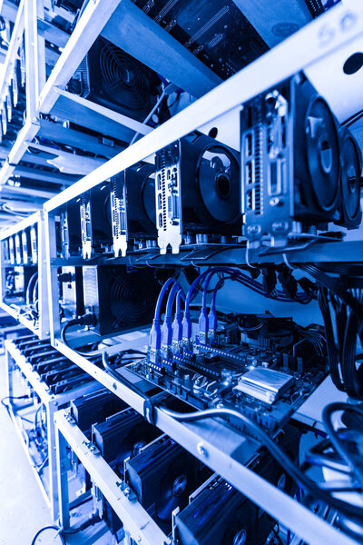 Cryptocurrency mining rig using graphic cards to mine for digital cryptocurrency
