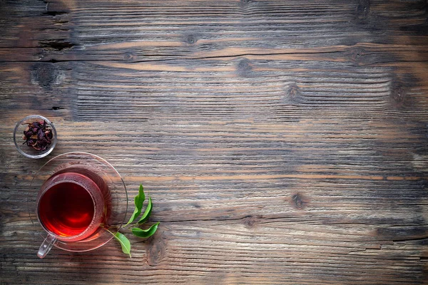 Çay vintage ahşap arka plan, düz üzerinde atış yatıyordu