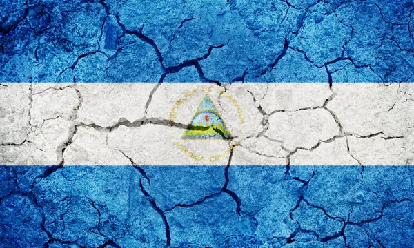 Bandera República Nicaragua Sobre Tierra Seca Textura Fondo — Foto de Stock