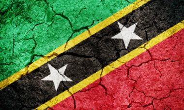 Saint Kitts ve Nevis bayrak kuru toprak zemin doku arka plan üzerinde