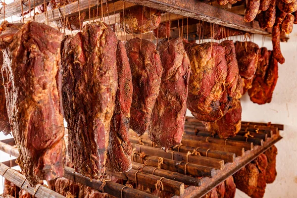 Smoked pork meat in a factory storage