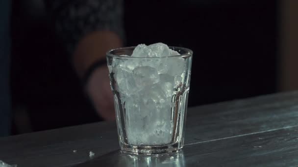Bartender Putting Ice Cube Glass Process Making Cocktail Bar — Stock Video