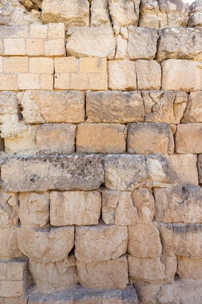 Parede feita de tijolos de pedra — Fotografia de Stock