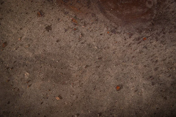Пятна ржавчины на поверхности бетонного пола — стоковое фото