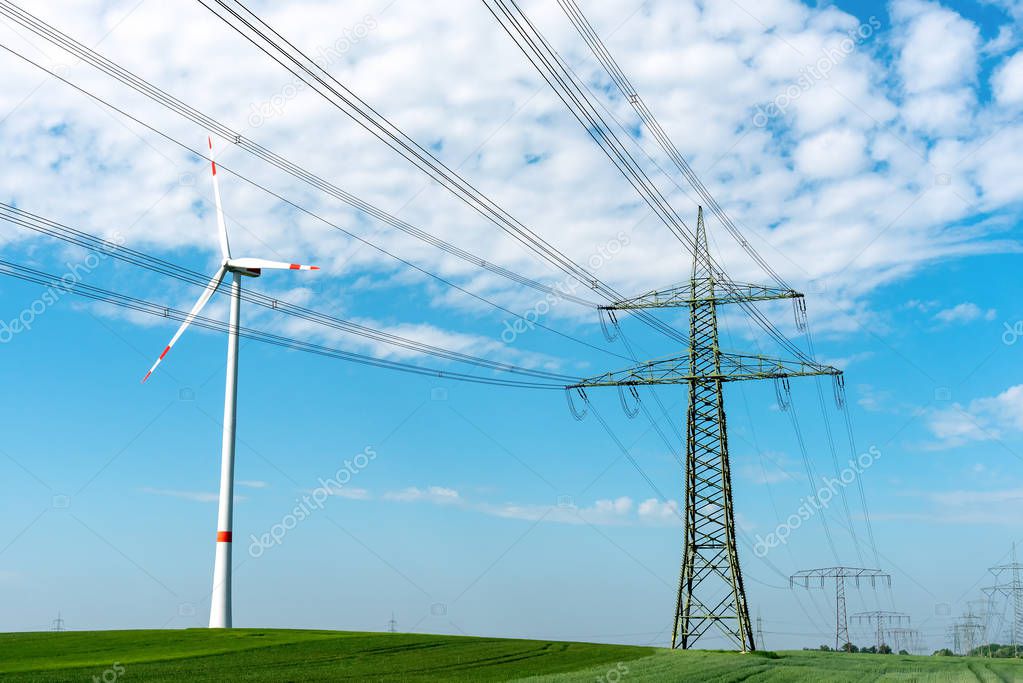 Power line and wind turbine seen in Germany
