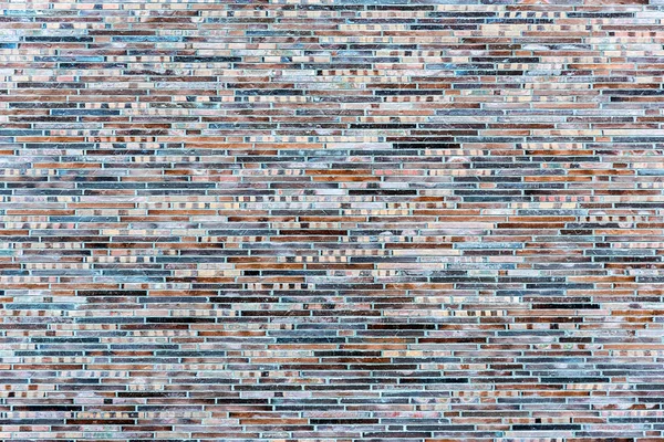 Hintergrund Aus Einer Wand Aus Kleinen Klinkersteinen — Stockfoto