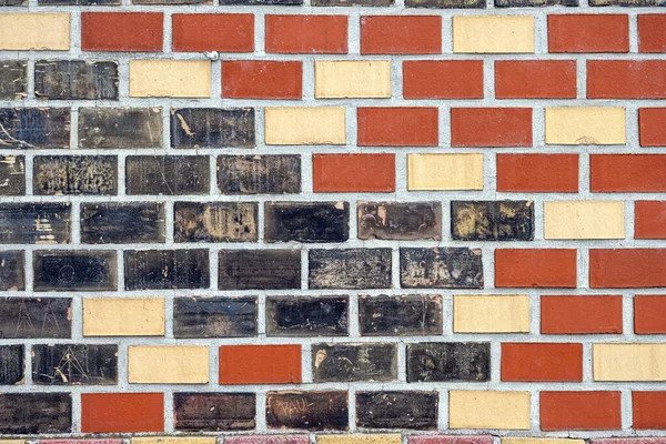 黑砖和米砖墙的背景 — 图库照片
