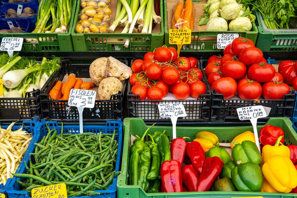 Rich selection of vegetables and salad for sale at a market