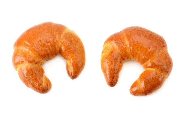 Nybakade Croissanter Isolerad Vit Bakgrund Ovanifrån — Stockfoto