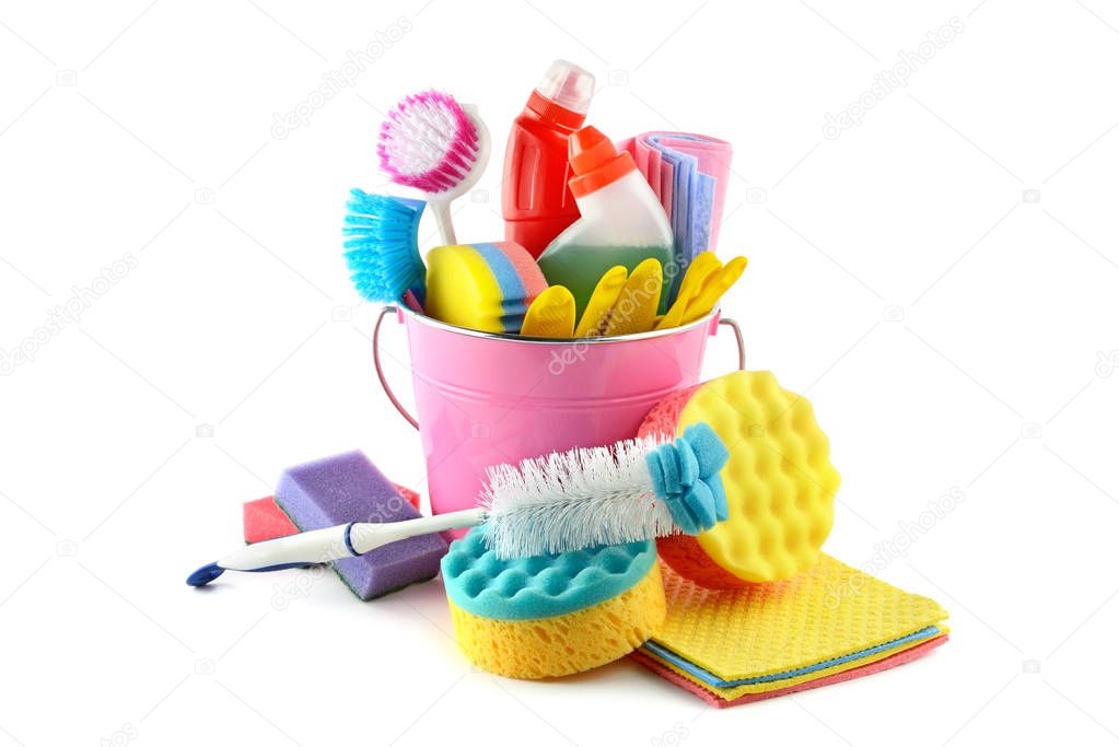 Set detergents in bucket (gloves, brushes, sponge, napkins) isolated on white background.