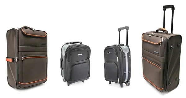 Комплект больших чемоданов для путешествий изолирован на белом — стоковое фото