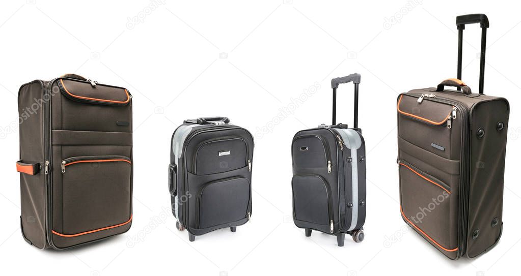 Set of large suitcases for travel isolated on white