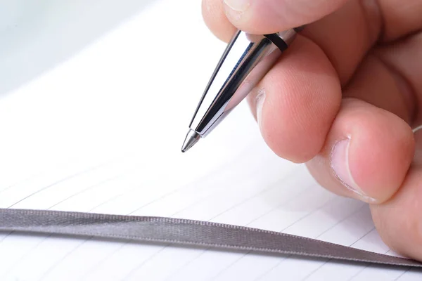 Macro Shot Hand Holding Pen Appointment Book — Stock Photo, Image