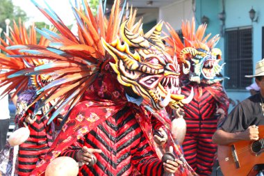  Los Santos, Panama, June 2017: Diablicos or Devils dancing on the streets of Los Santos, Panama celebrating Corpus Christi clipart