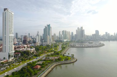 Aerial view of the beautiful skyline of Panama City and the Cinta Costera Boulevard clipart