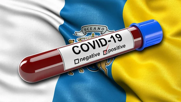 Kanarieöarnas Flagga Viftar Vinden Med Ett Positivt Blodprovsrör Från Covid — Stockfoto