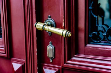 Beautiful bronze (brass) door handle with monograms  clipart
