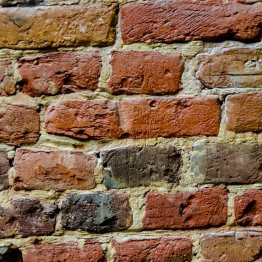 Abstract background - an old wall of red ceramic bricks.  clipart