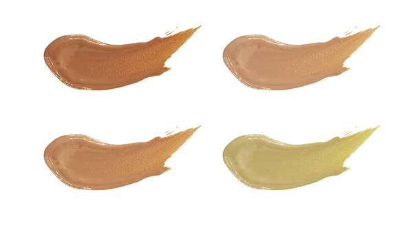 Producto cosmético. Una colección de cuatro tonos de color beige untado s — Foto de Stock