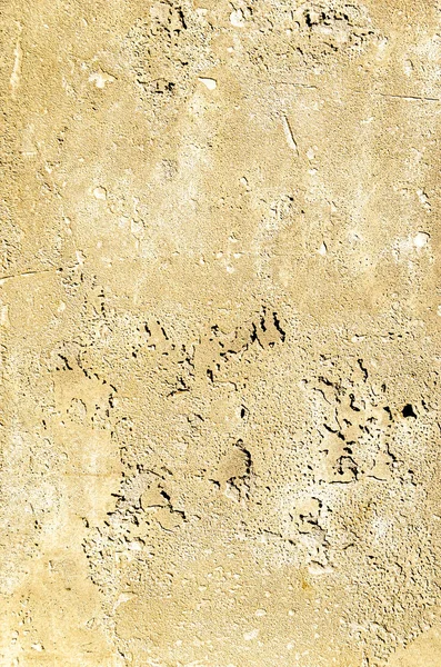 Stedelijke betonnen wand achtergrond met groeven en bubbels. Cement — Stockfoto