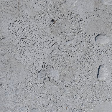 Oluklar ve kabarcıklar ile Kentsel beton duvar arka plan. Çimento 