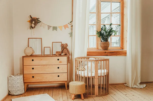 Scandinavian style children's room interior. A cozy oval baby be — Stock Photo, Image