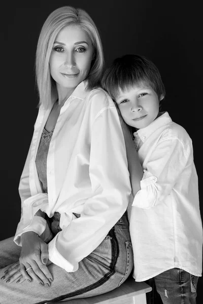 Mother and son. Black and white photo.