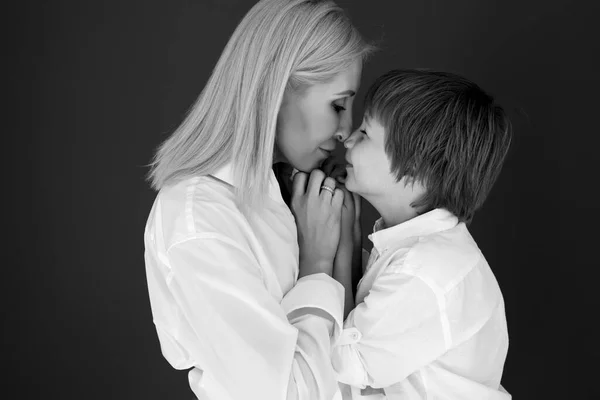 Mother and son. Black and white photo.
