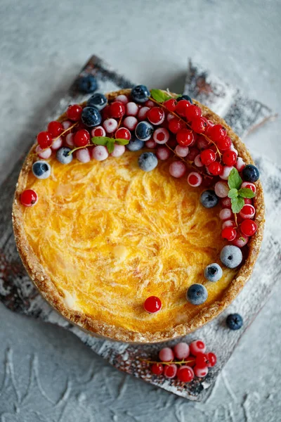 Cheesecake cake with berries. Cake with delicate curd and dough base.