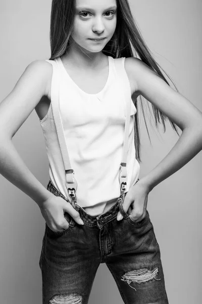 Beautiful child. Little girl in black and white studio. — Stock Photo, Image