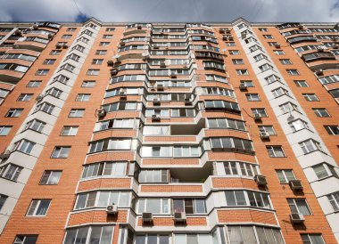 MOSCOW, RUSSIA - AUGUST 13, 2018: Modern high-rise apartment building in the city of Moscow. clipart