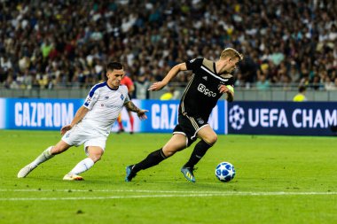 Kiev, Ukrayna - 24 Ağustos 2018 oyuncular eylem sırasında Uefa Şampiyonlar Ligi maç Dinamo Kiev Afc Ajax Kiev, Ukrayna Milli Güvenlik Olimpiyat Stadyumu'nda.
