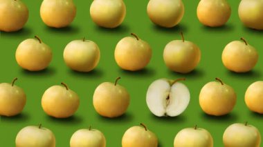 Taze sarı elma yeşil arka plan üzerinde renkli meyve deseni.