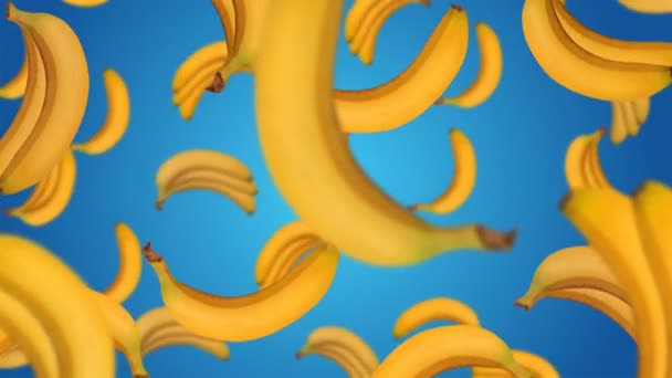 Бананы Падают Синий Фон Видео — стоковое видео
