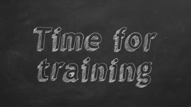 黒い黒板に 訓練のための時間 を描く モーションアニメーションの停止 — ストック動画