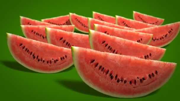 Wassermelonenscheiben Auf Grünem Hintergrund Großaufnahme Video — Stockvideo