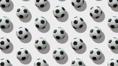 Büyük bir futbol takımının geçmişi. Toplar beyaz arka planda eksenlerinin etrafında döner. Düz yerde, üst tarafta. Isome Manzarası. Kusursuz döngü videosu. 