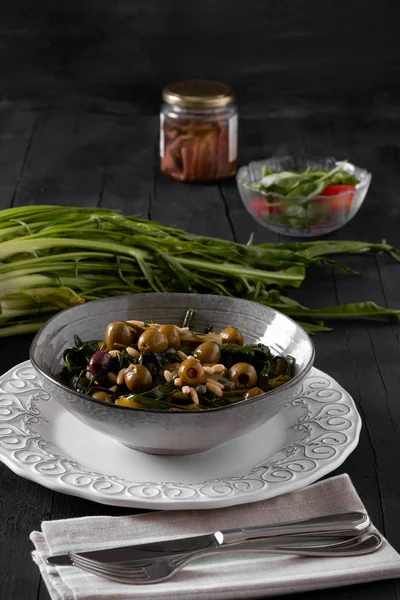 Bowl Steamed Chicory Hearts Salad Olives Anchovies Pine Seeds Capers — Stock Photo, Image