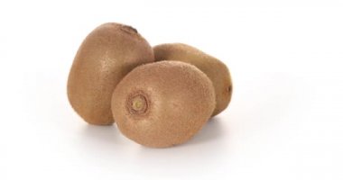 Kivi meyve beyaz arka plan üzerinde dönen. 