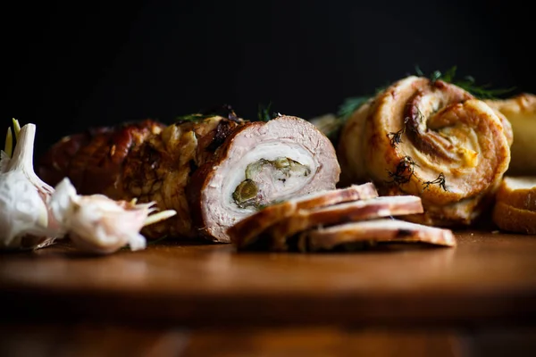 Roll of meat with various spices and herbs — Stock Photo, Image