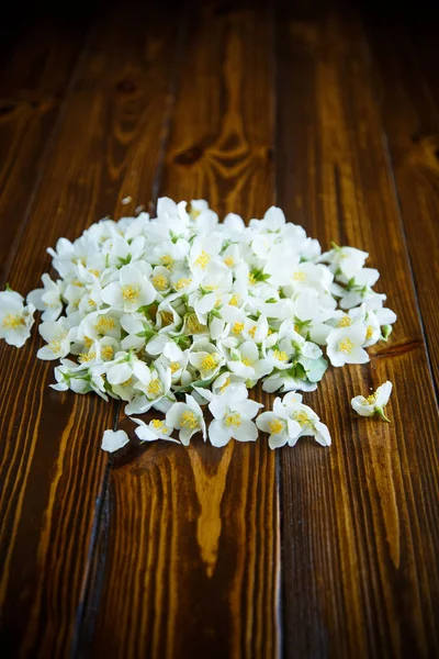 Torn Blossoming Jasmine Flowers Wooden Table — Stock Photo, Image