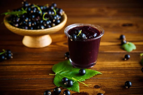 Zoete Jam Van Zwarte Bessen Bessen Een Houten Tafel — Stockfoto