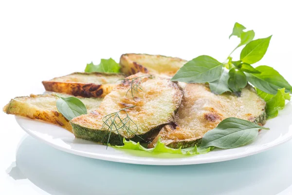 Fried zucchini in a white plate — Stock Photo, Image