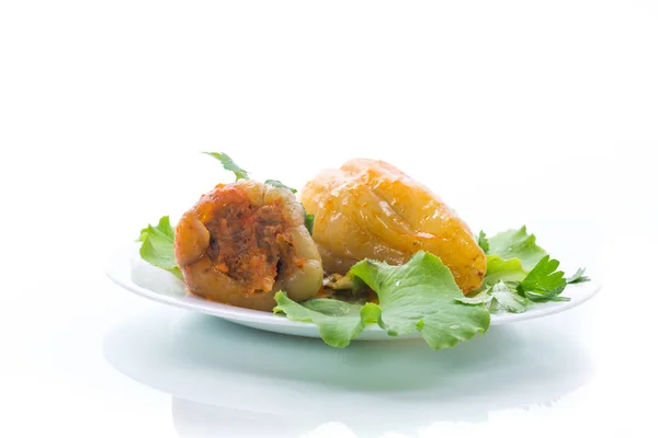 Stewed in tomato sauce stuffed peppers in a plate — Stock Photo, Image