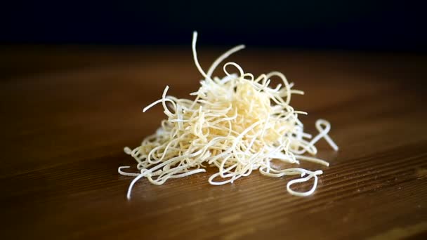 Egg homemade dried finely chopped noodles on table — Stock Video