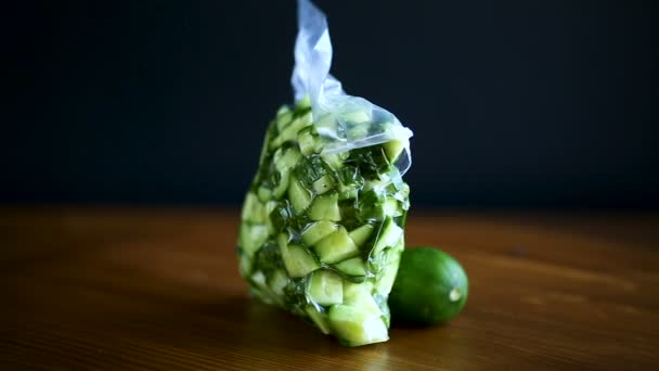 Fresh sliced cucumbers in a vacuum package — Stock Video