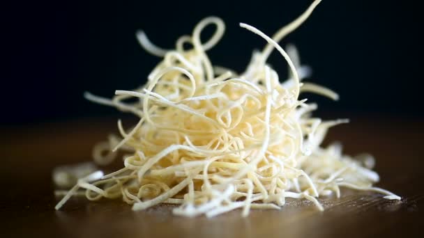 Egg homemade dried finely chopped noodles on table — Stock Video