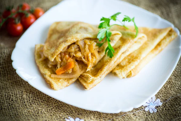 Thin Fried Pancakes Stuffed Stewed Cabbage Plate Background Sackcloth — Stock Photo, Image