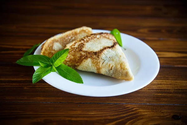 Thin Sweet Pancakes Folded Form Triangle Sprig Mint Plate Wooden — Stock Photo, Image